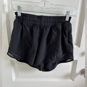 Hotty Hot Low-Rise Lined Short 4” in Black by Lululemon.